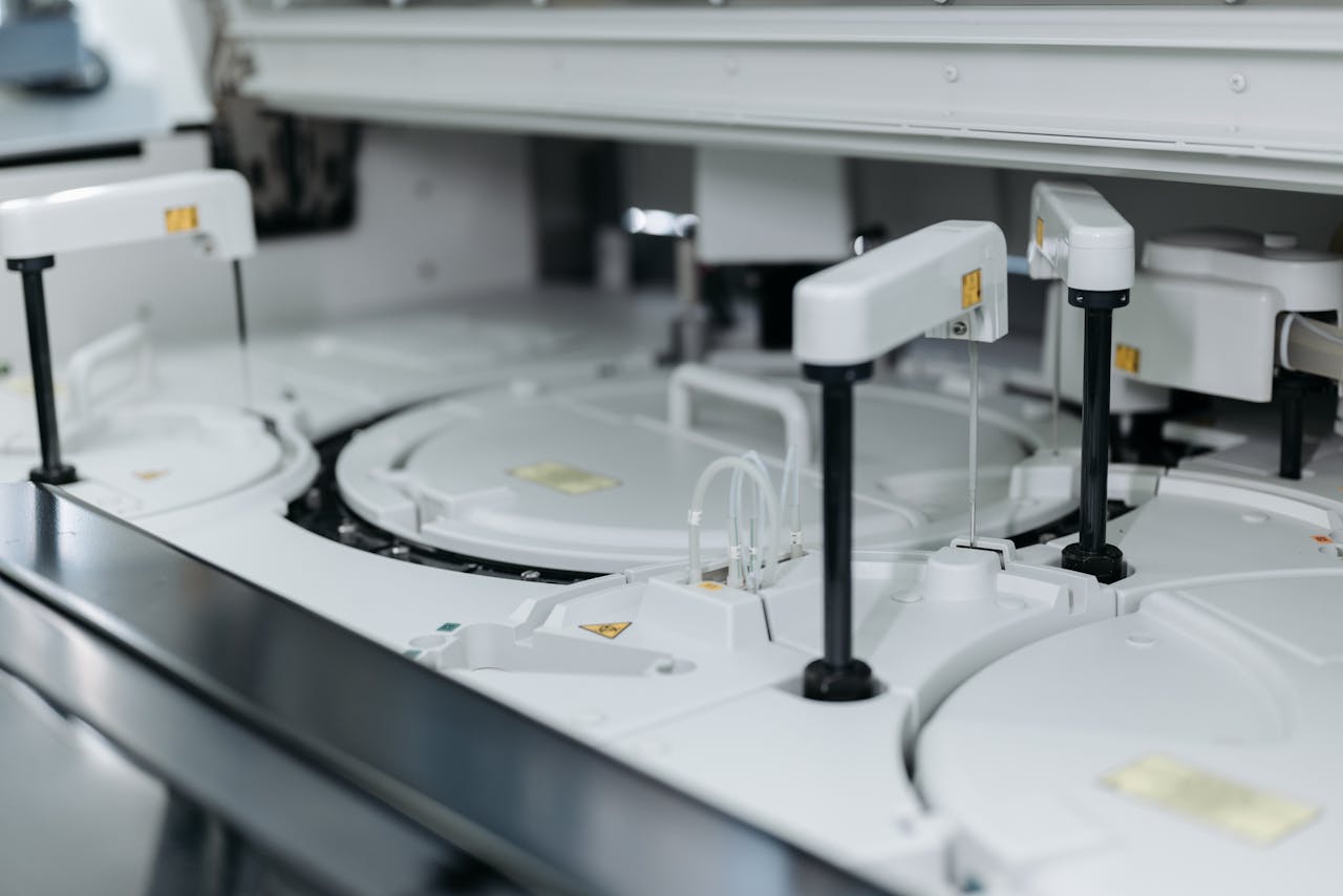services-02 Close-up of advanced laboratory machinery in a medical facility, showcasing precise scientific equipment.